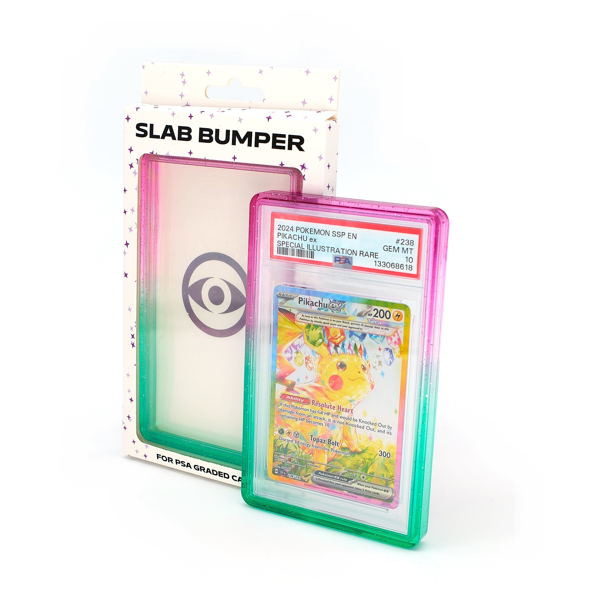 Espionage PSA Slab Bumper in Pink / Green with its retail box and a graded card