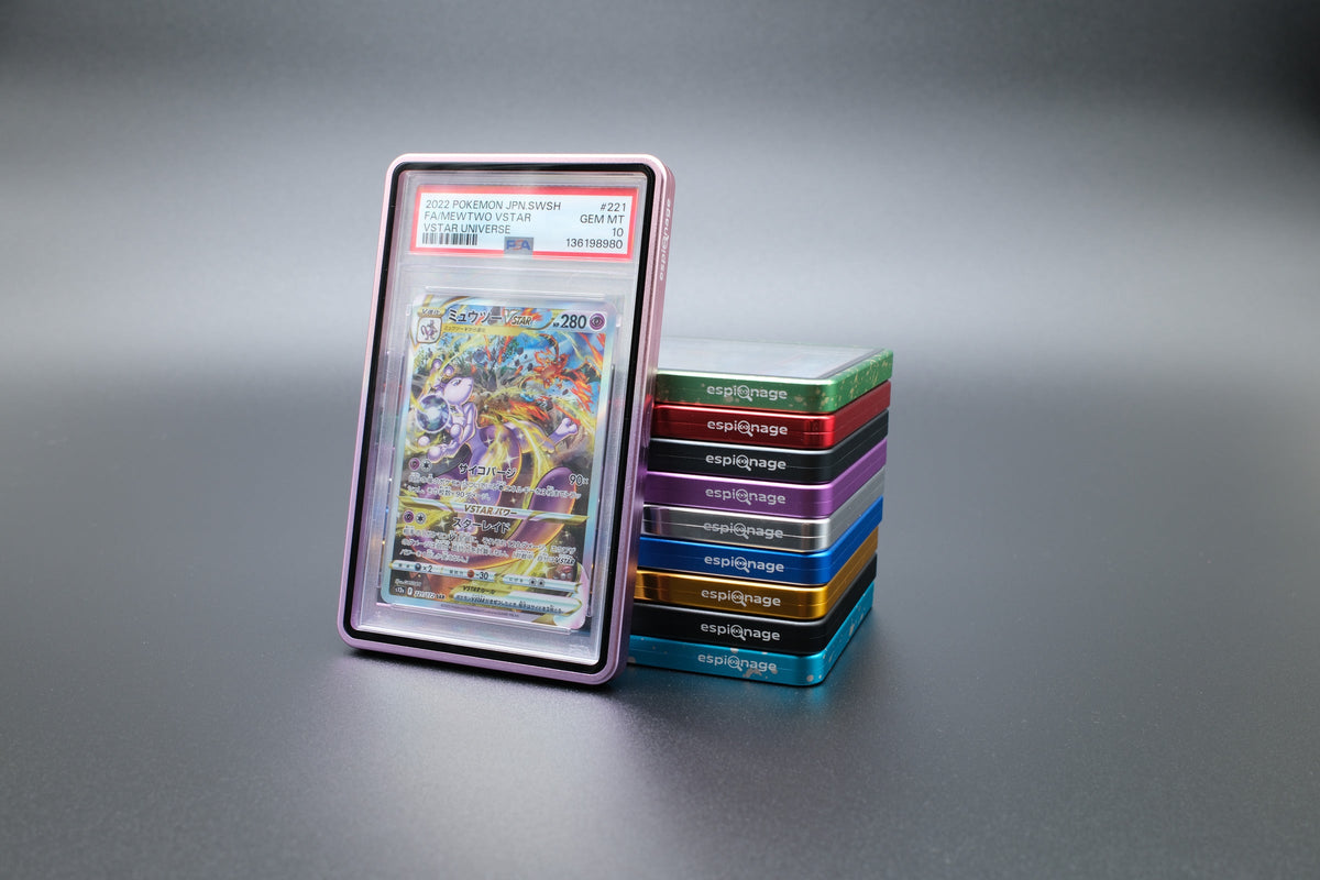 Pink and Purple Aluminium Slab Guard holding a PSA graded Pokemon card