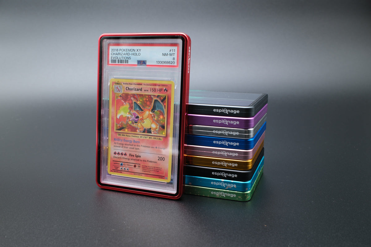 Red Aluminium Slab Guard holding a PSA graded Pokemon card